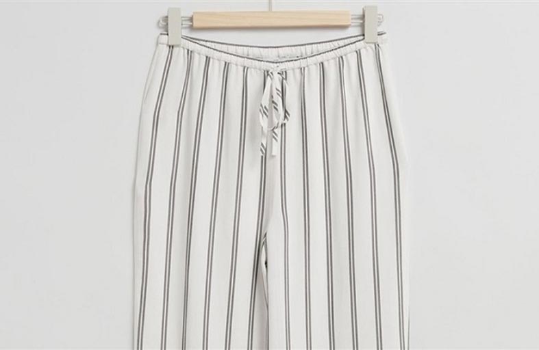 بنطلون القماش المقلم نجم صيف 2023