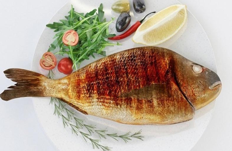 تناول الأسماك أثناء الحمل قد يحد من خطر إصابة الأطفال بالتوحد