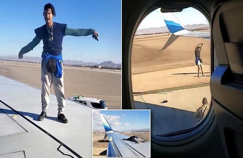 اعتقال رجلا صعد فوق جناح الطائرة