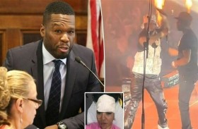 50 سنت يضرب معجبة بالميكروفون