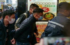 دهم موقع إخباري في هونغ كونغ واعتقال عدد من موظفيه 