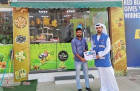 بلدية مدينة أبوظبي تنفذ حملة نظافة عامة أمام المحلات التجارية في منطقة ربدان 