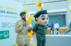  شرطة دبي تحتفي بشهر التوعية بمرض السرطان 