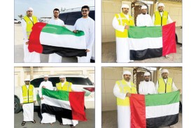 بلدية الحمرية توزّع أعلام الدولة على الأهالي في منازلهم… واحتفاء مجتمعي يجسّد: فخورون بالإمارات