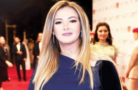 دنيا سمير غانم تغسل أحزانها بـ(عالم موازي)
