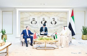 صقر غباش يستقبل السفير الصيني