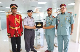 شرطة أبوظبي تستقبل وفدًا من موسيقى شرطة رأس الخيمة