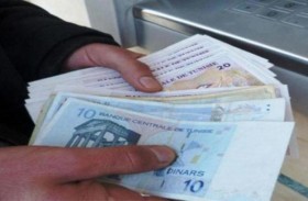 الدينار التونسي يهبط لمستوى قياسي جديد مقابل الدولار 