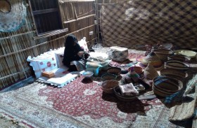 سوق قرية التراث الشعبي بالقرية العالمية يرمز لحياة الأجداد.. (2)