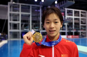  معجزة الغطس الصينية المراهقة كادت تعتزل بعد «بلوغ الحد الذهني» 