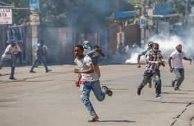 الشرطة الهايتية تطلق الغاز المدمع على متظاهرين 